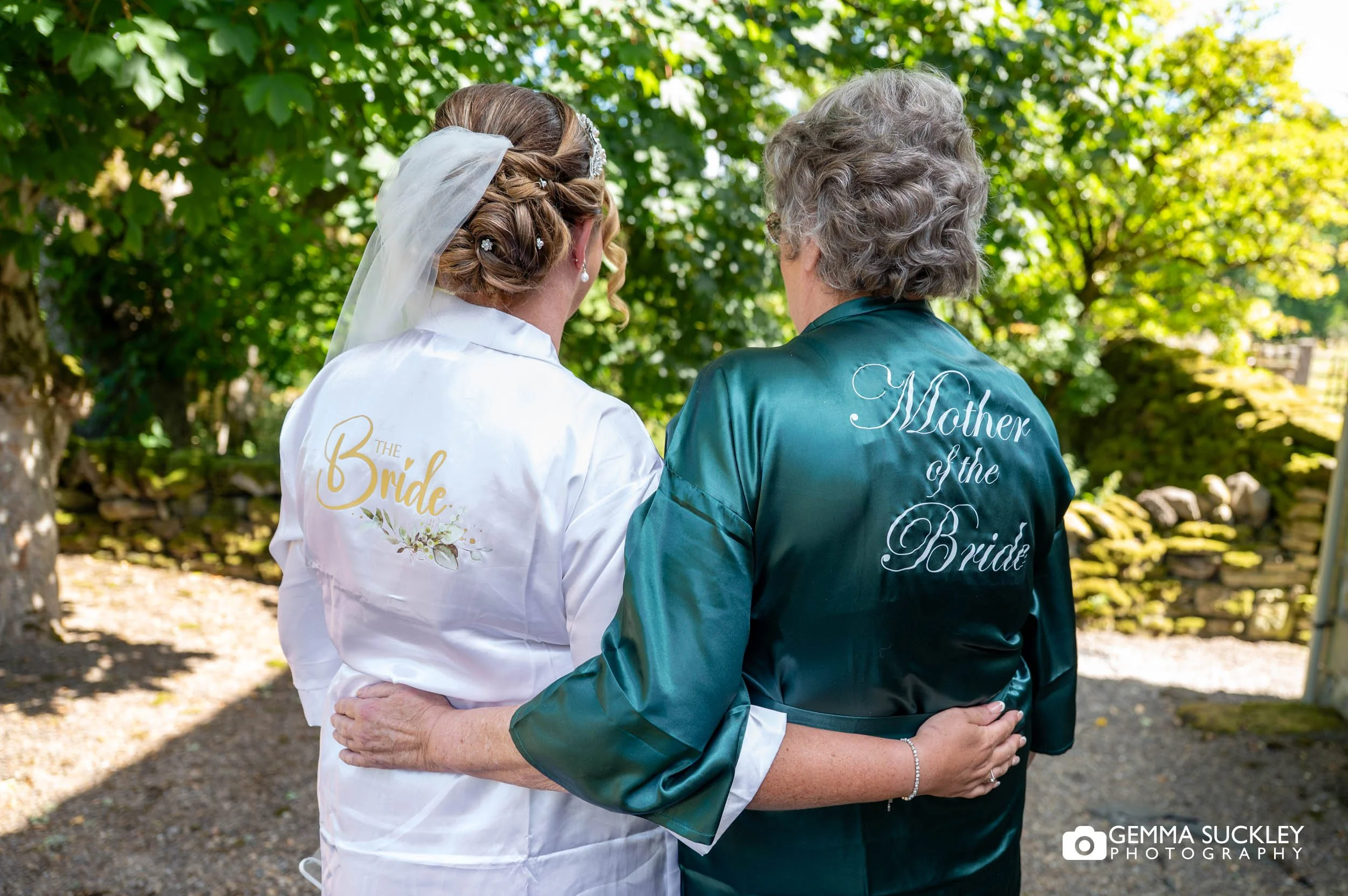 bride and her mum in bridal dressing gowns