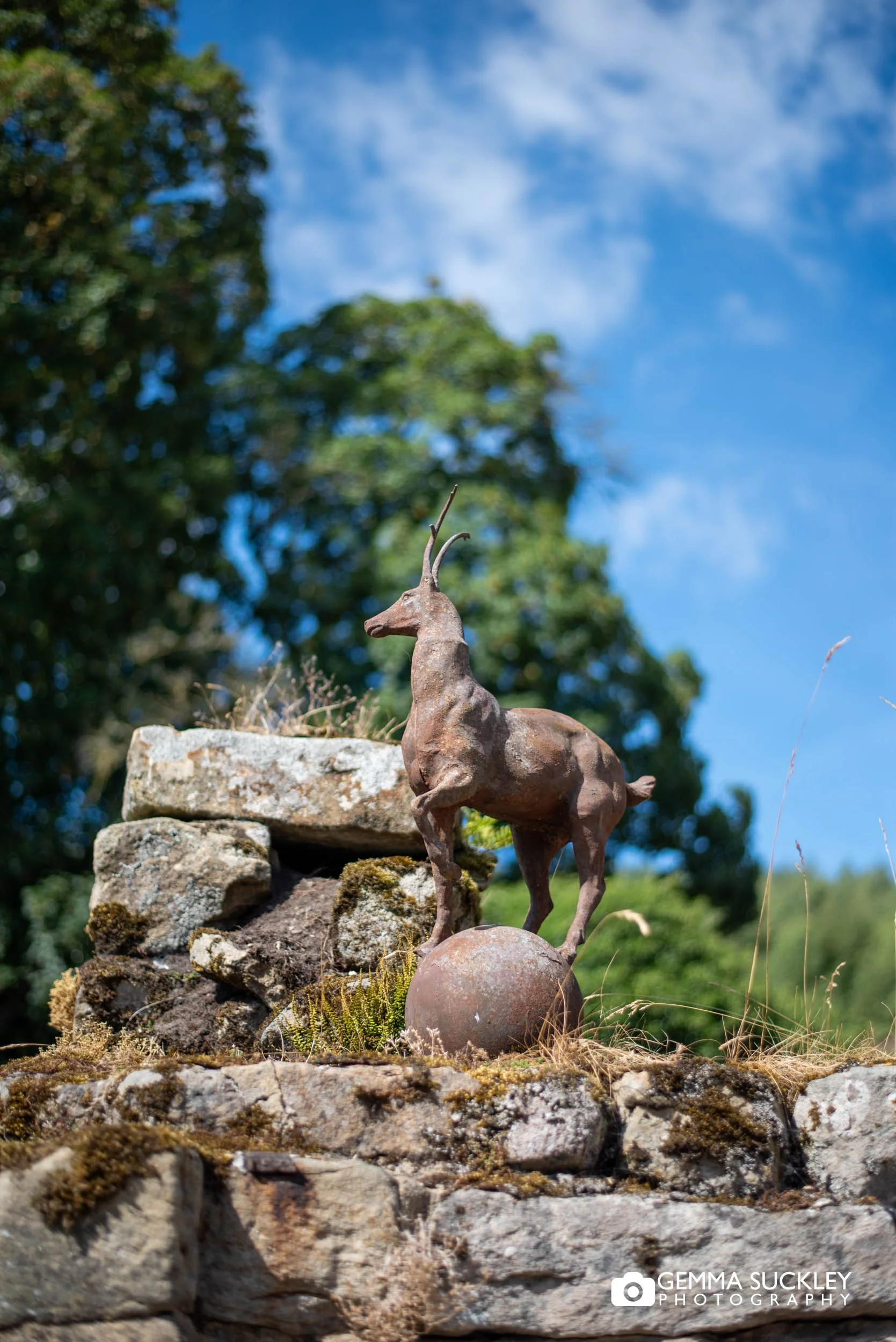 stag statue outside the priests house