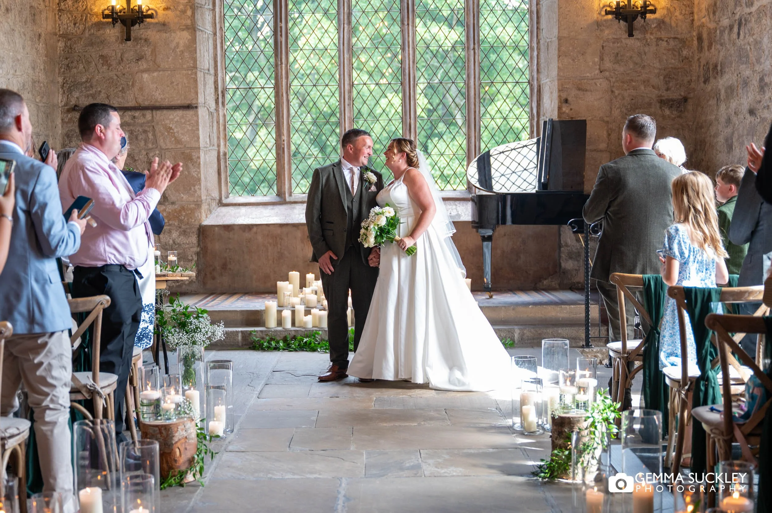 just married couple walking down the aisle at the priests house