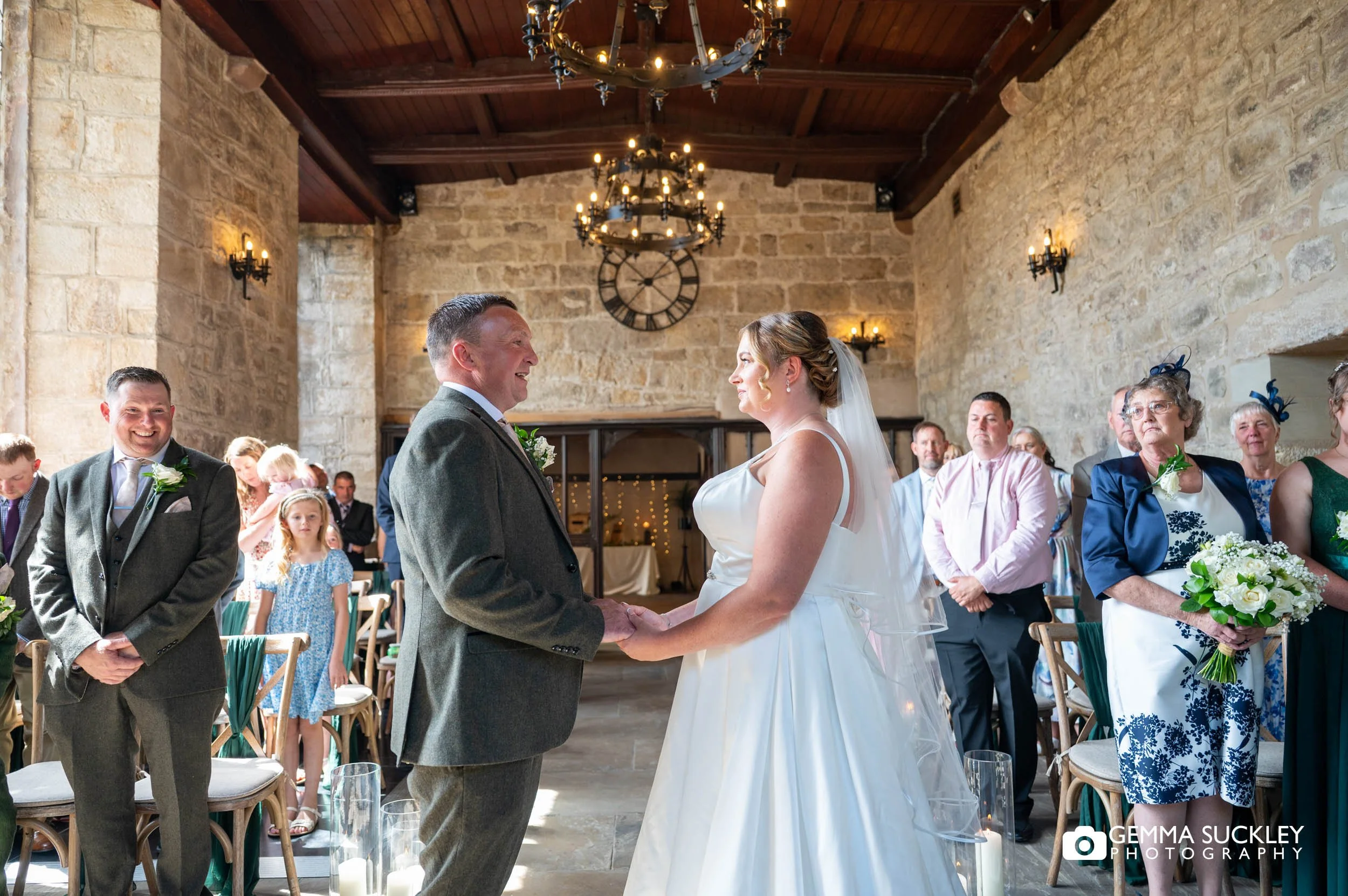 bride and groom saying vows at the priests house