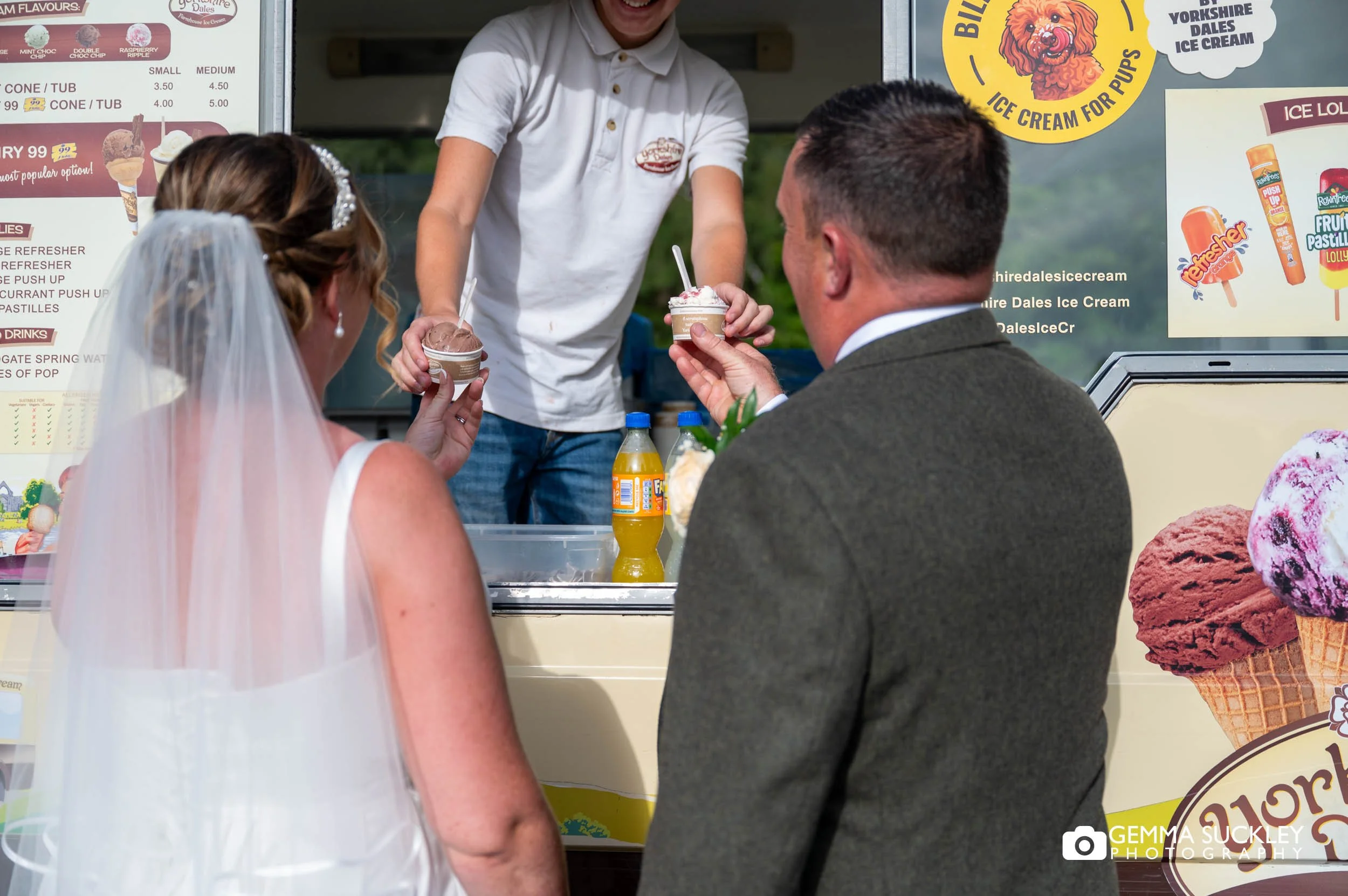 bride and groom getting ice creams at bolton abbey