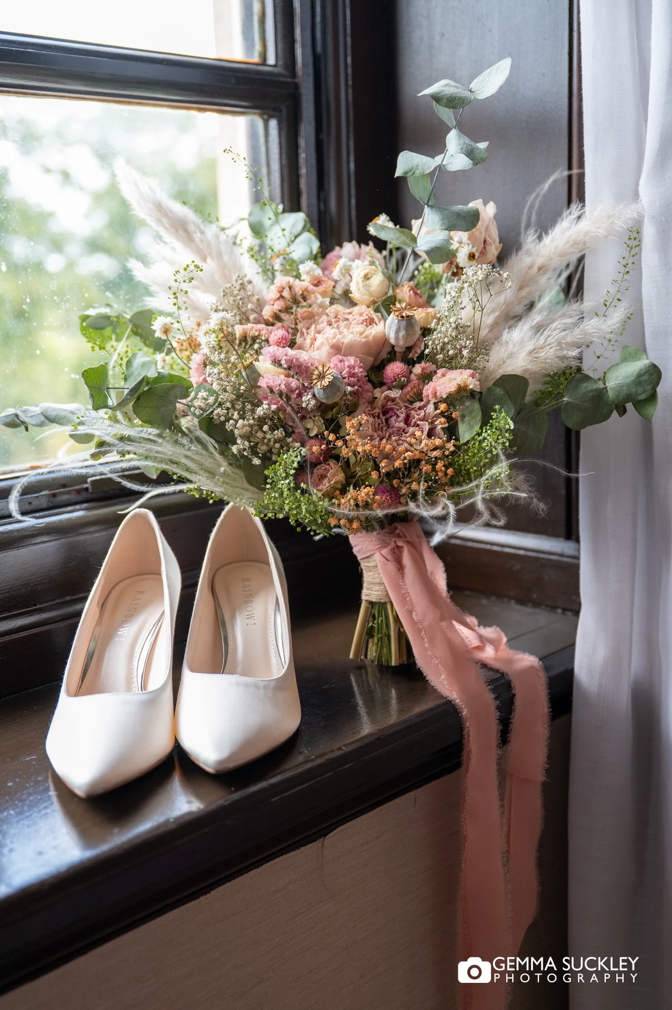 bridal shoes and bouquet