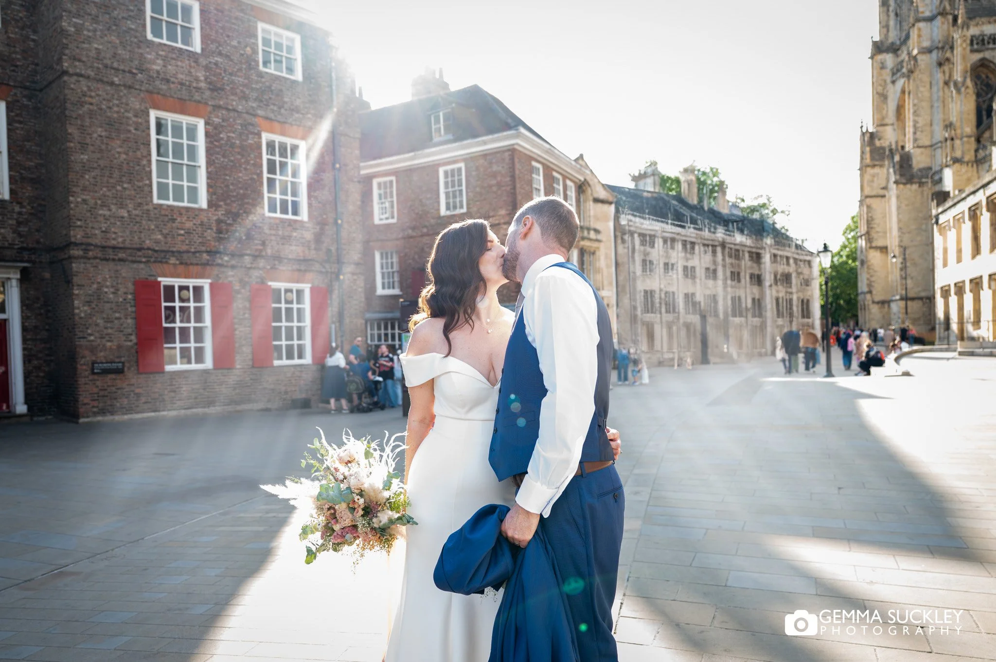 bride and groom in the afternoon sun