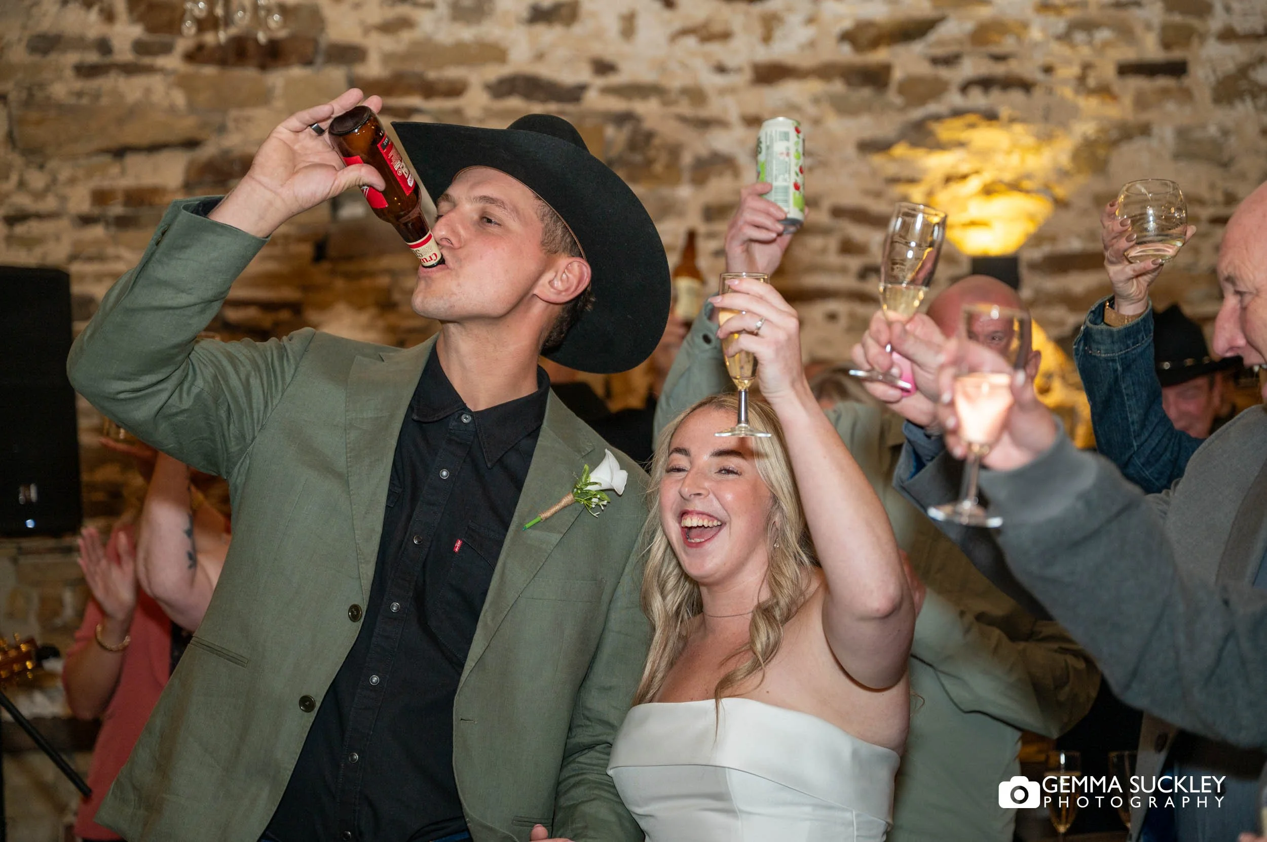 just married couple making a toast