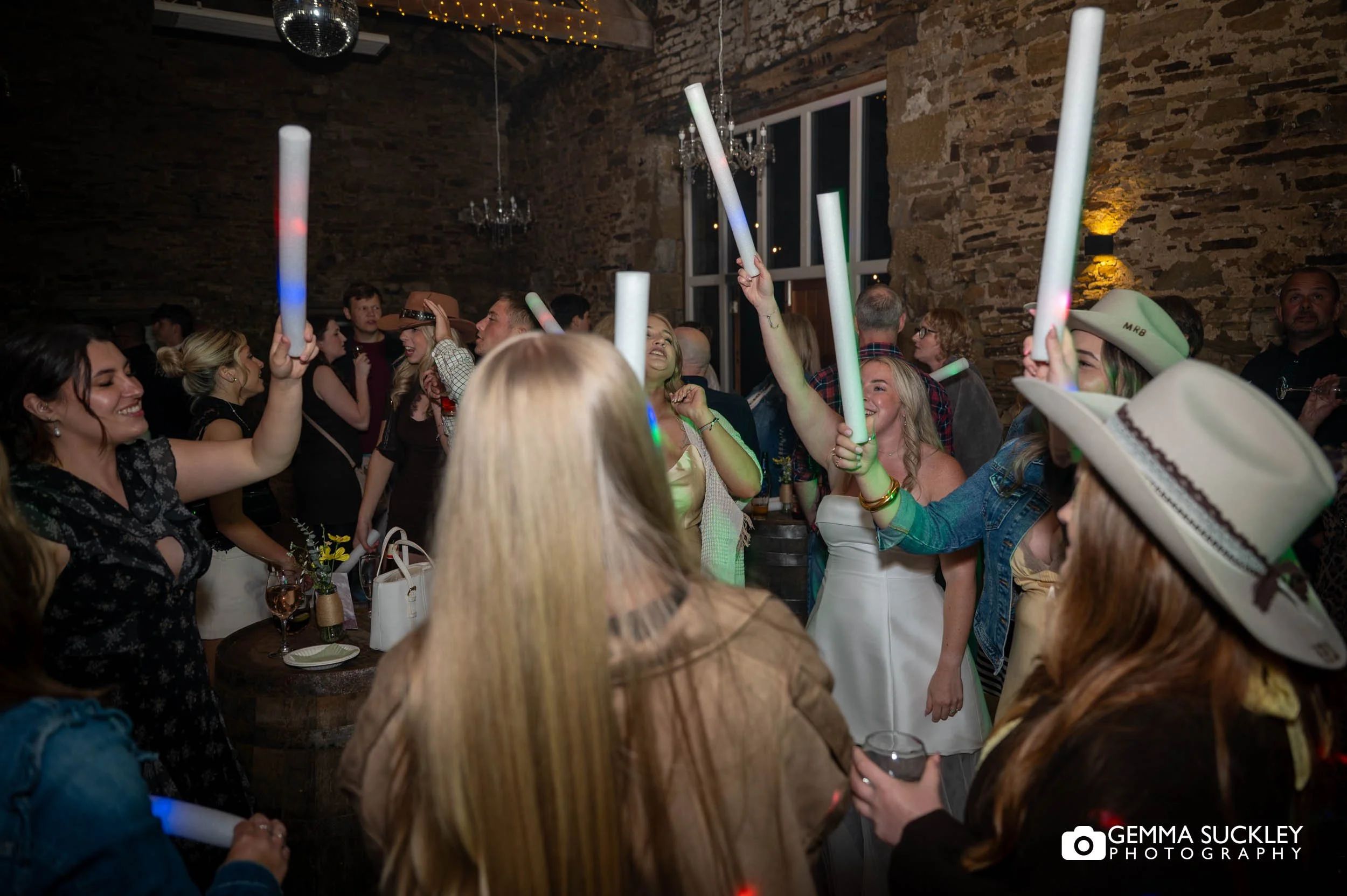a busy dancefloor at silsden barn wedding