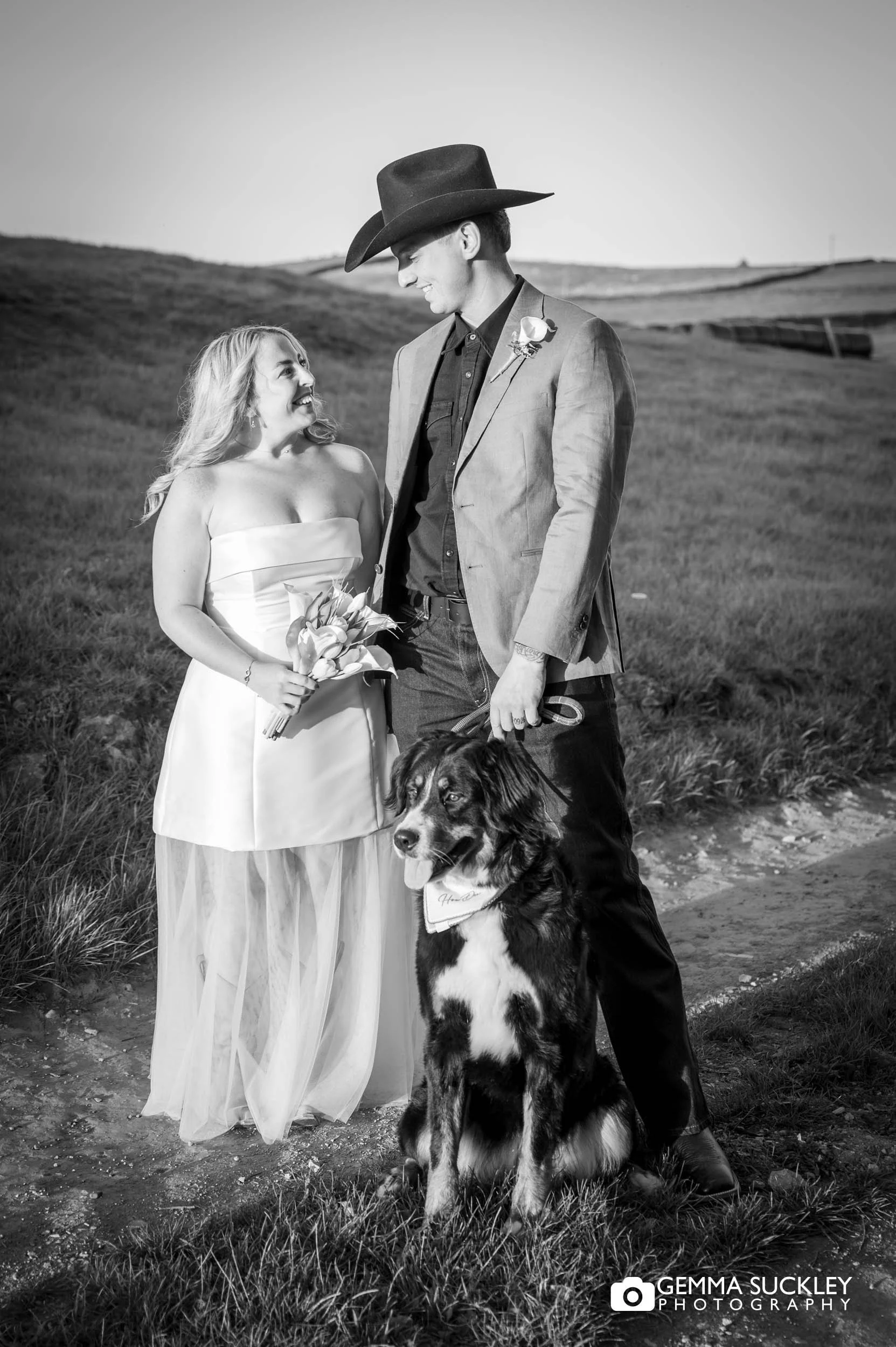 bride and groom with their dog