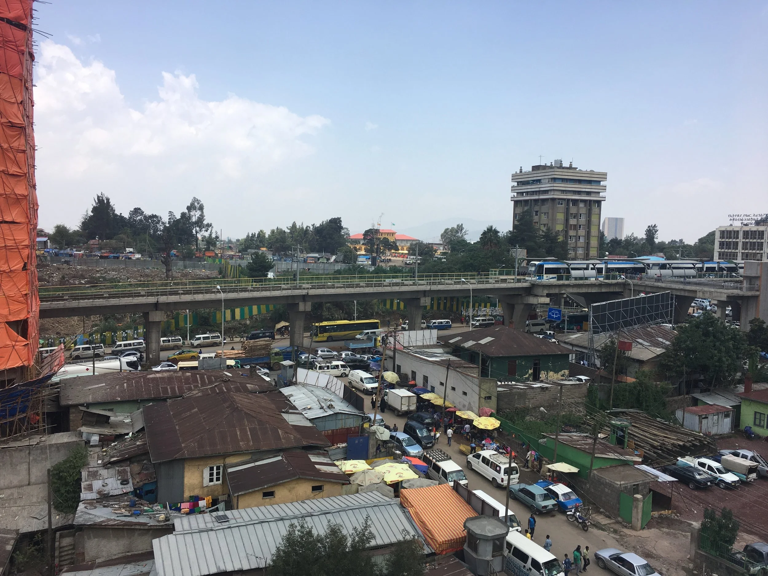 A view of downtown streets and the new metro line from the rooftop of the Ethiopian Development Research Institute.