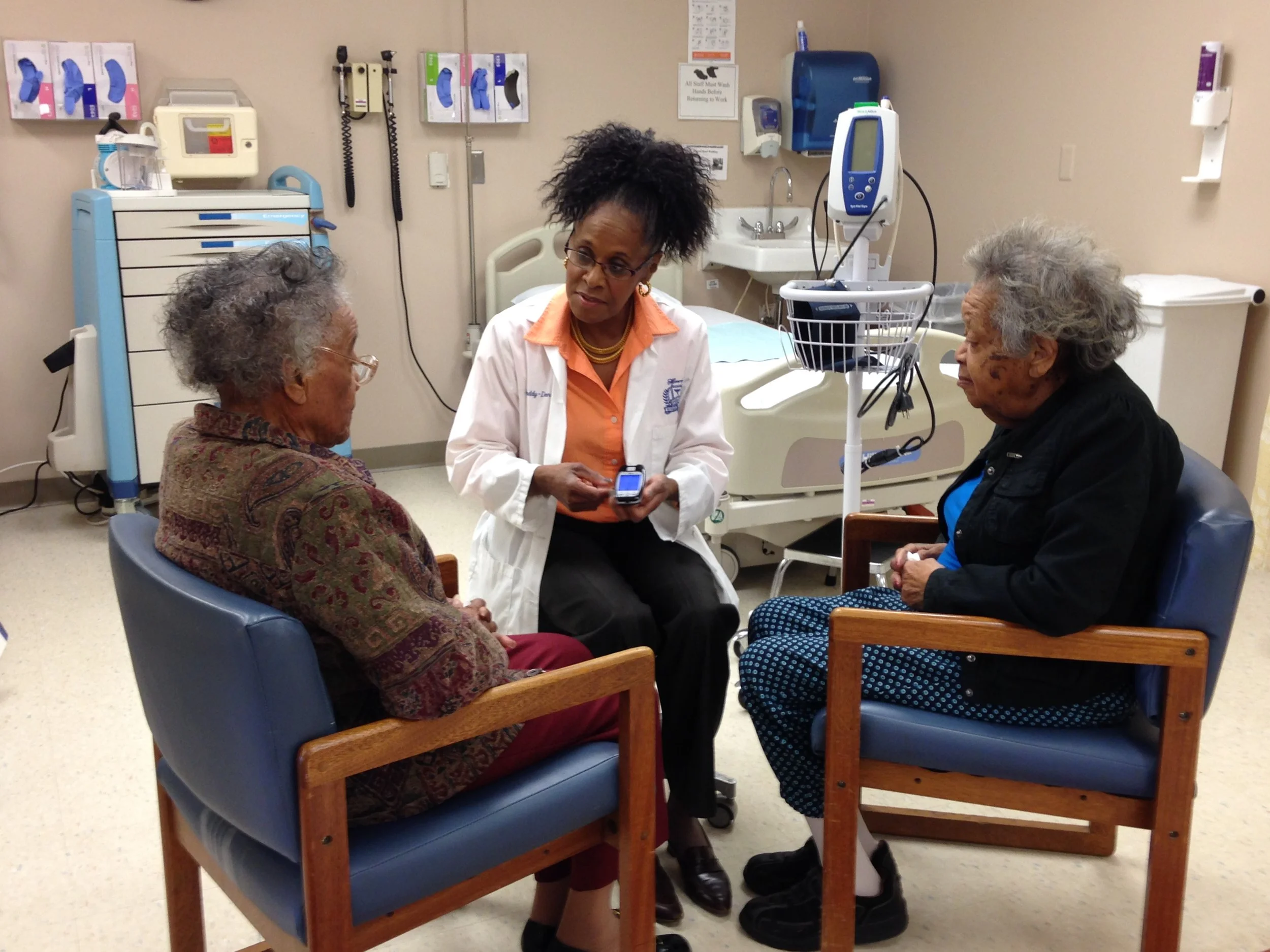 Medical Director, Dr. Gwendolyn Graddy with two of the participants in our program