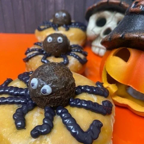 Only treats, no tricks on October 31st. Donut be scared, Halloween donuts are available with our "spider" (chocolate cake mill bite) sitting on top of a vanilla cake donut OR yeast donut.  These scary beauties are offered at $3.59 each and