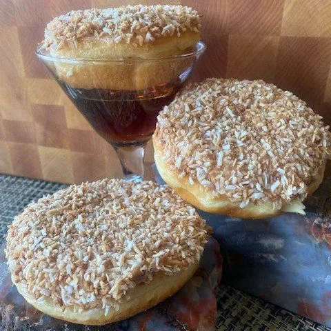 Oh maple...I love thee but...oh do I ever wish to go somewhere tropical! Our feature donut for March combines the flavours of home with adventure in our Island Maple donut.  That taste of an island adventure(coconut), is combined with a hint of maple