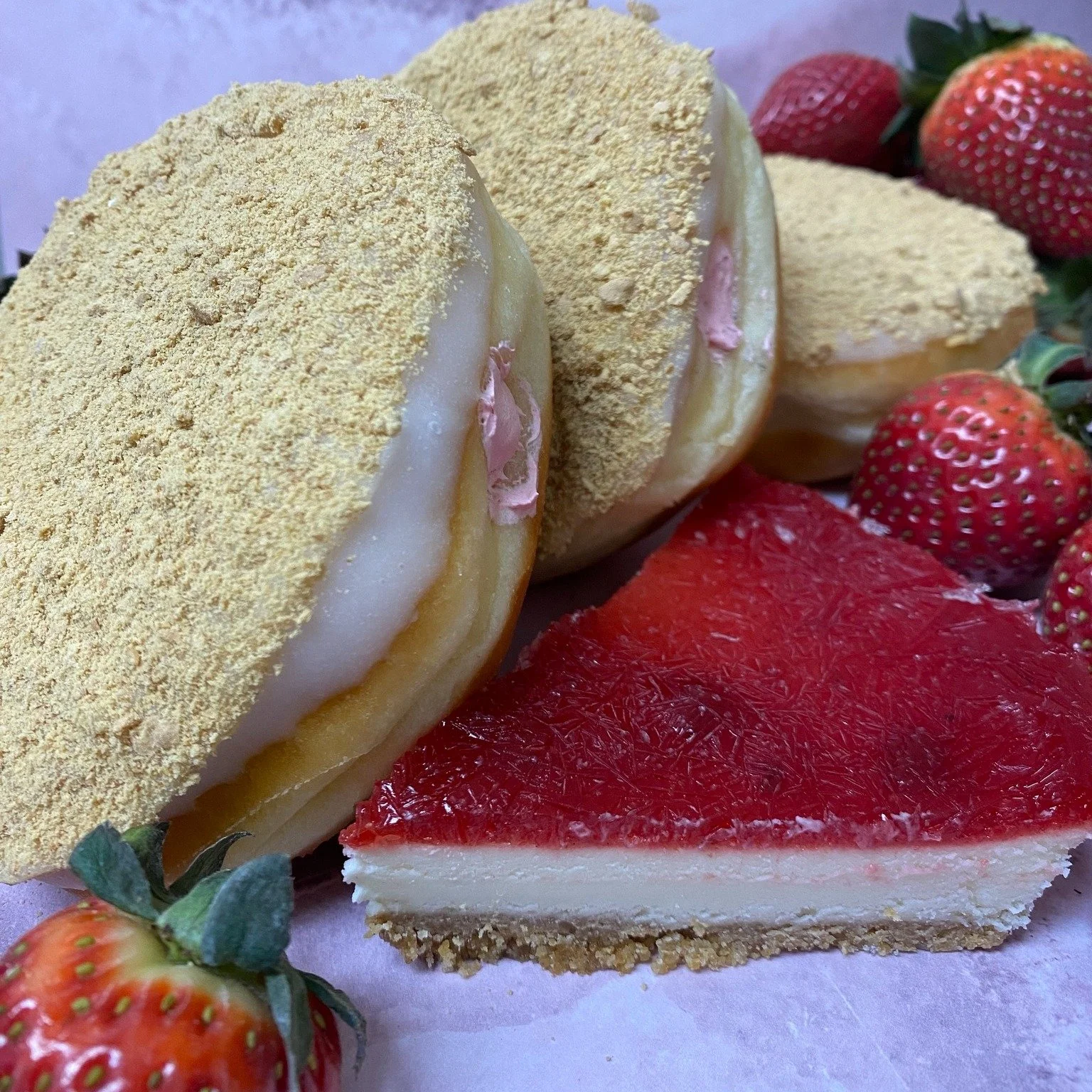 Celebrate mom  with a delicious Strawberry Cheesecake donut--strawberry flavor and whipped topping stuffed inside a fluffy donut and topped with graham crumbs creates one of mom's favourites.  Only available on Mother's Day! (May 10th) #donutmillredd