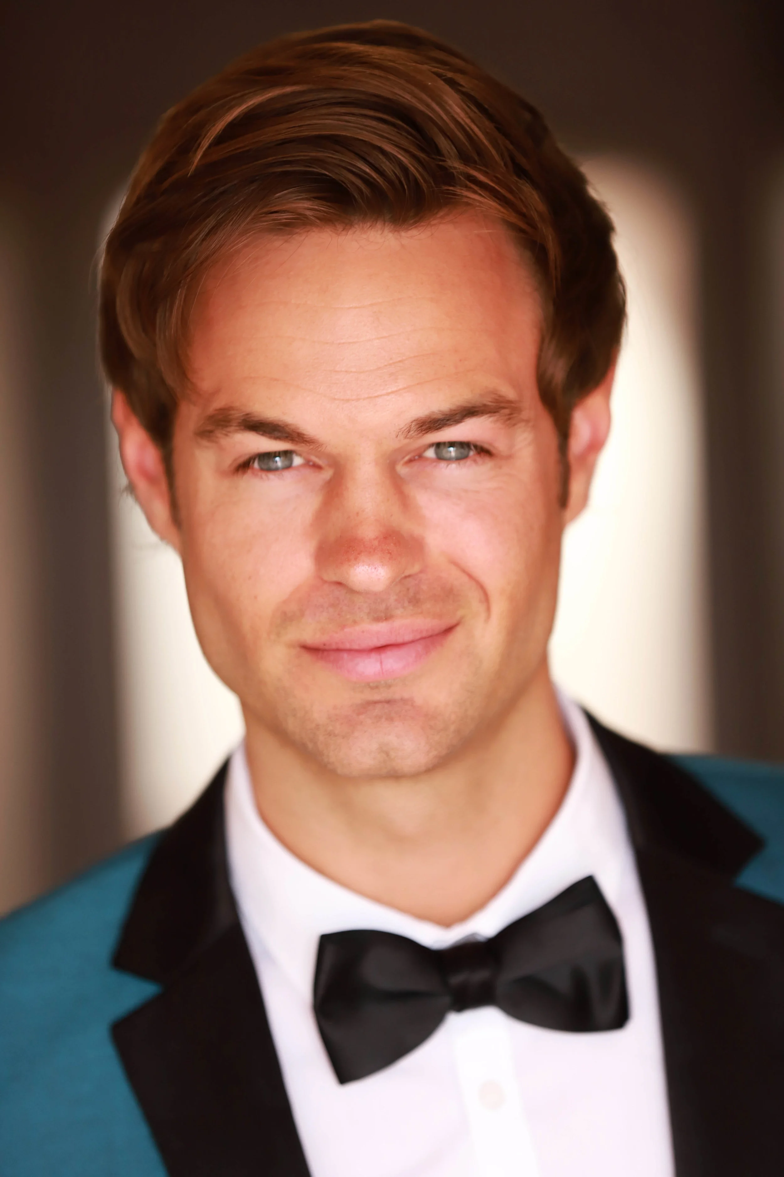 webheadshot tux (1).jpg