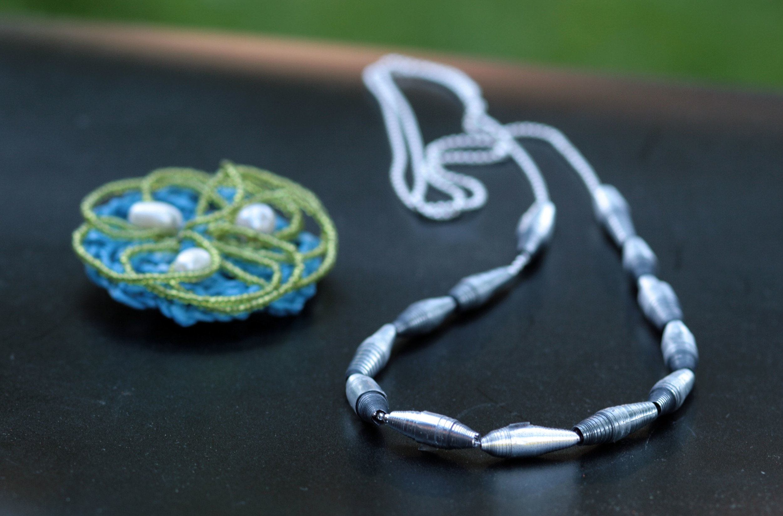 Necklace made of plastic from the inside of a wine box.