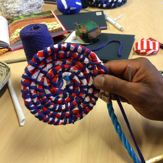 The beginning of a coiled basket.