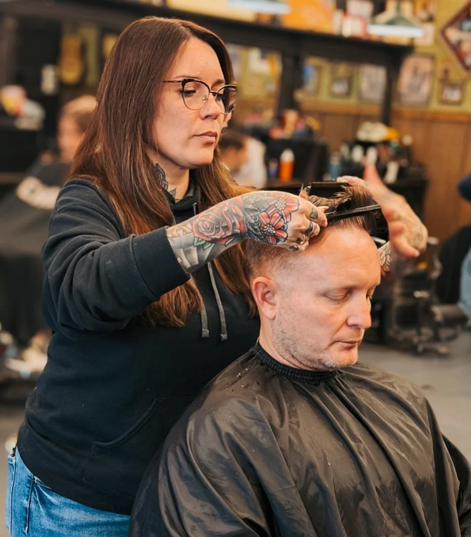 Serious face. Serious skill 💈

Meet Lauren ✂️

Known for the serious look&mdash;but the skills speak louder. Precision cuts, clean fades, and a fully personalized experience every time. She takes the time to get it right, so your cut stays sharp lon