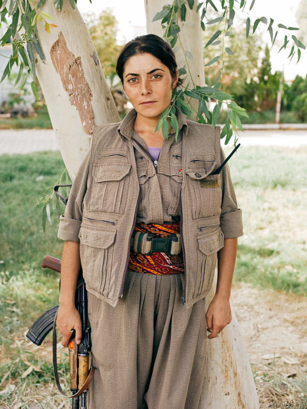 A PKK female fighter is part of a training camp of Makmour in Northern Iraq.