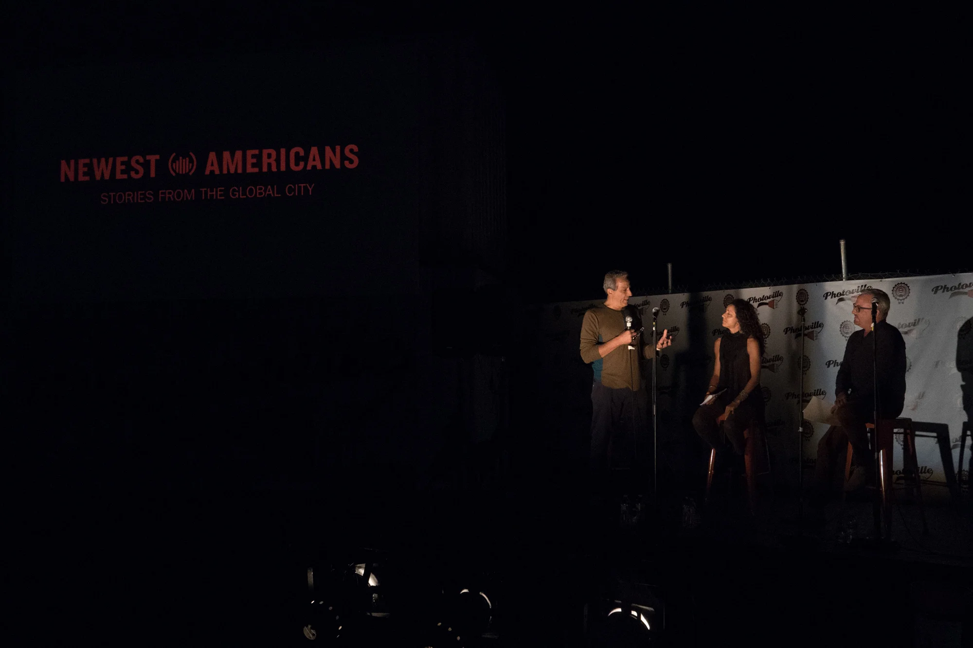 Newest Americans partners Ed Kashi, Julie Winokur, and Tim Raphael introduce the project in the Beer Garden at Photoville's Opening Night. (Photo by Stephanie Khoury)