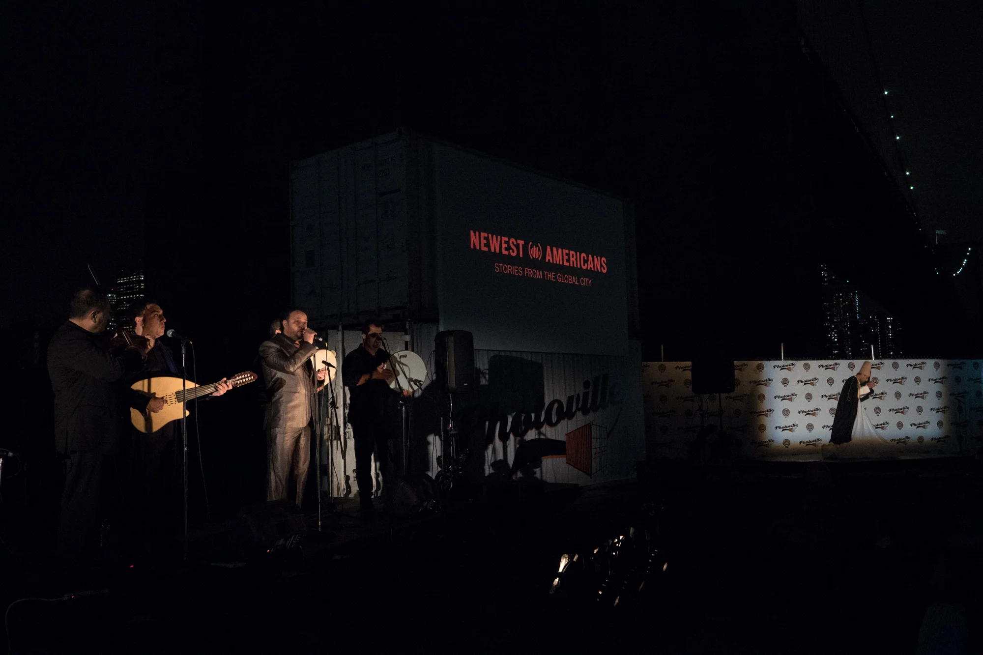 After a screening of Notes for My Homeland, Mohammed Alsaidi and company perform traditional Syrian music in Photoville's Beer Garden on Opening Night, accompanied by a whirling dervish. (Photo by Stephanie Khoury)