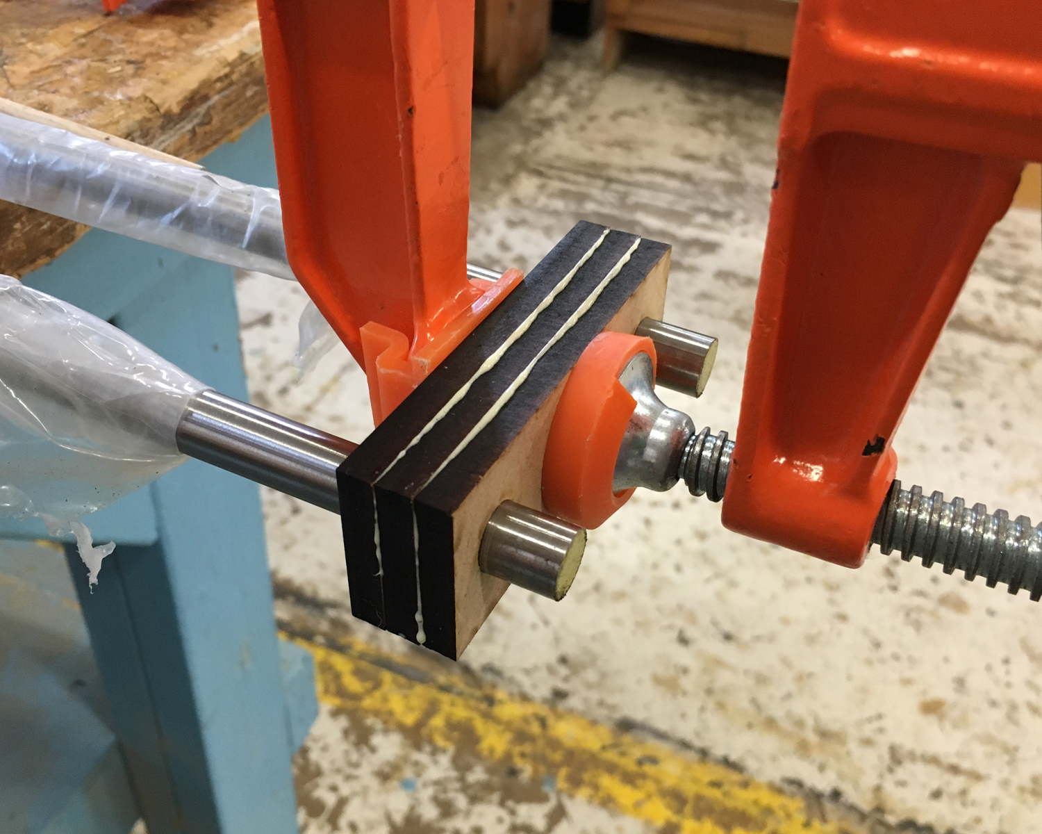 Bearing rod support. Bearing rods used for alignment during glueing