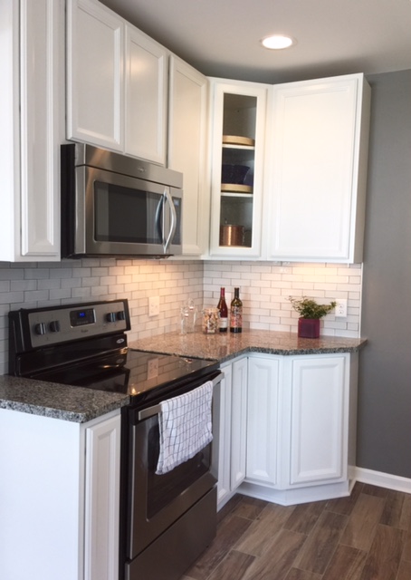 Kitchen renovation, tile flooring, granite tops, subway tile backsplash, new cabinets & appliances