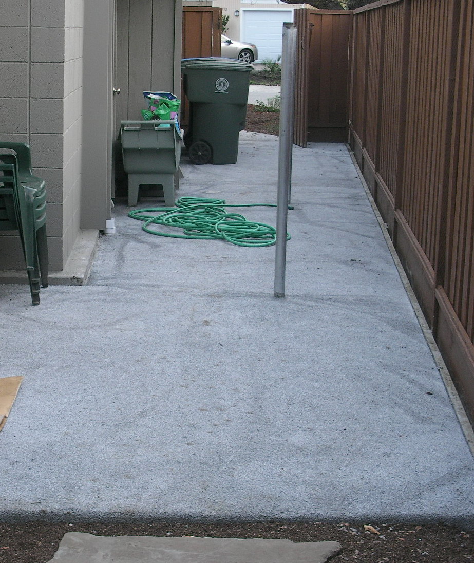 Sideyard after- Now this space can be used for laundry and garbage bin storage.