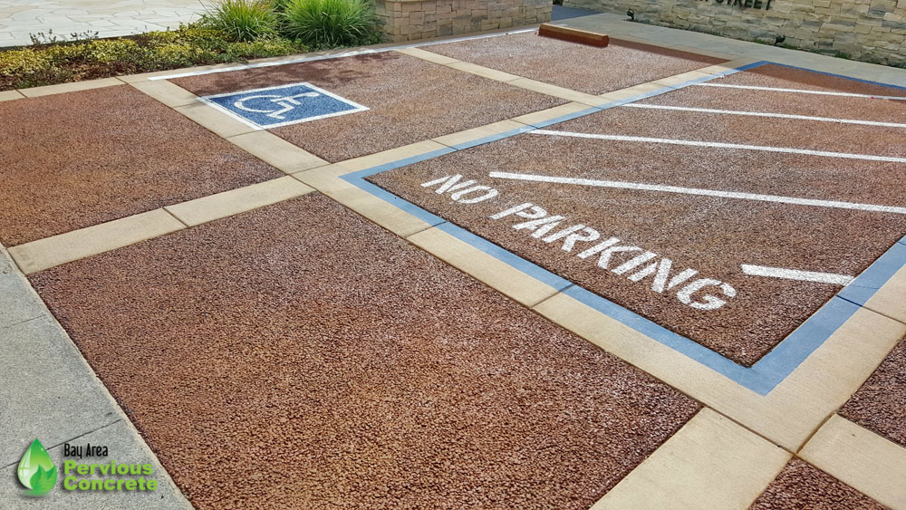 Classic Colored Pervious Concrete with traditional concrete border - Post St Office Parking Stalls - Palo Alto, CA