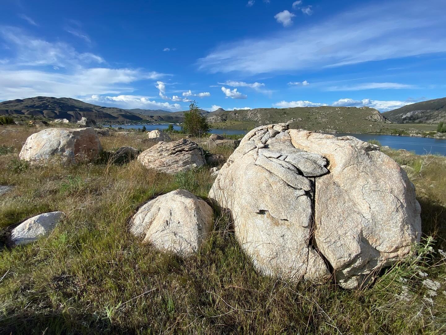 Boulders at Pateros. Ice Age Flood 14,000 years ago. @bradylawrencephoto hard at work.