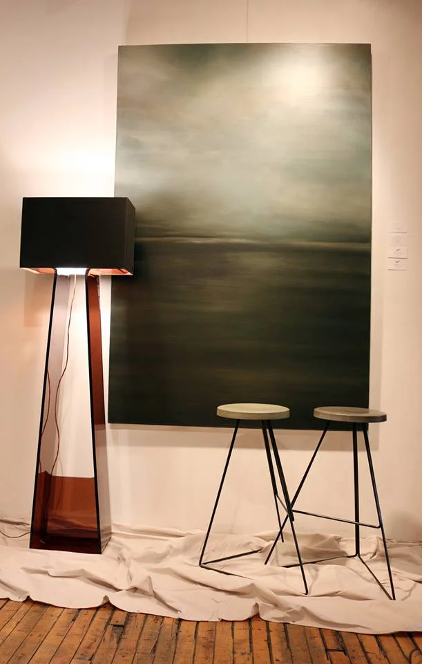The crowd's favorite Vignette featuring a beautiful Richard Rehl piece and a modern lamp and two stools from Rypen's furniture collection.