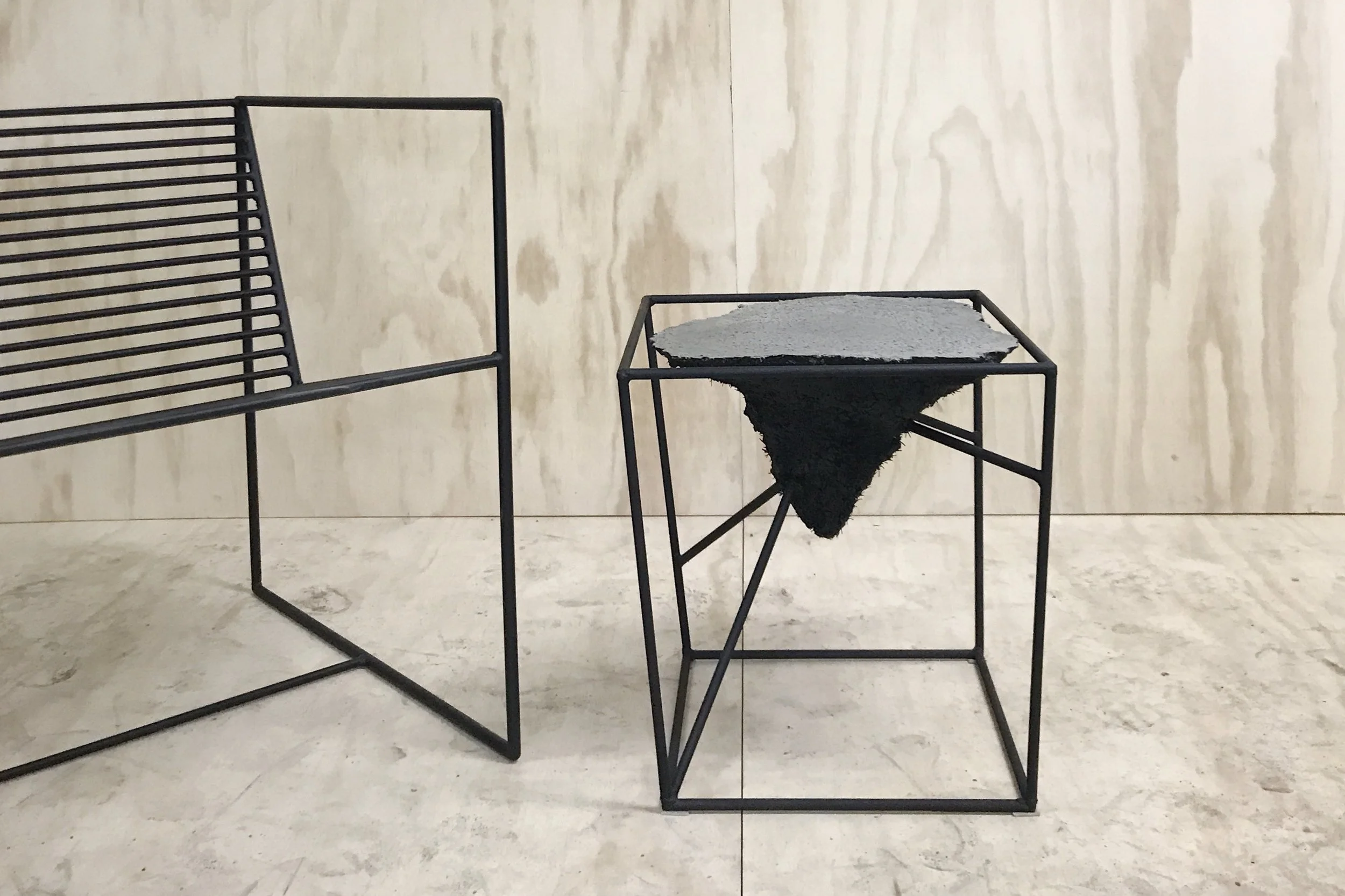 Concrete side table with metal framework