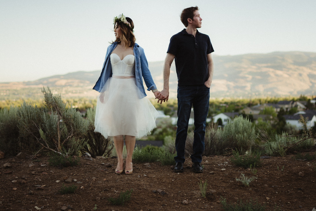 Husband and wife overlooking Reno, NV for their anniversary pictures