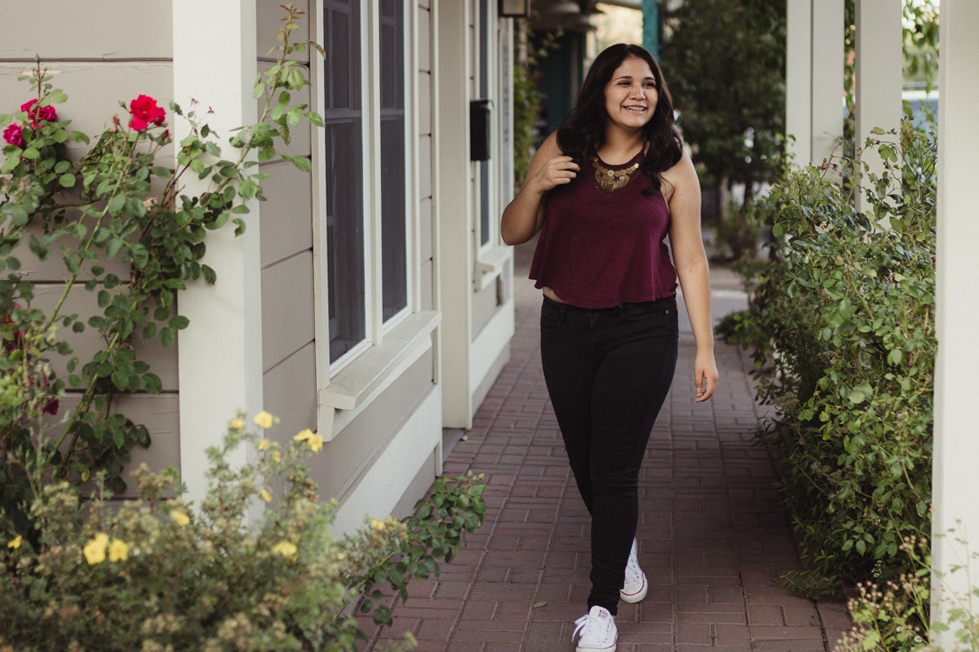 Lake Tahoe senior pictures of a girl walking in downtown Truckee