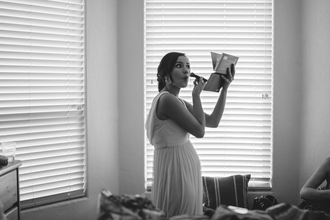 Lake Tahoe California Wedding Photographer bridesmaid applying makeup photo