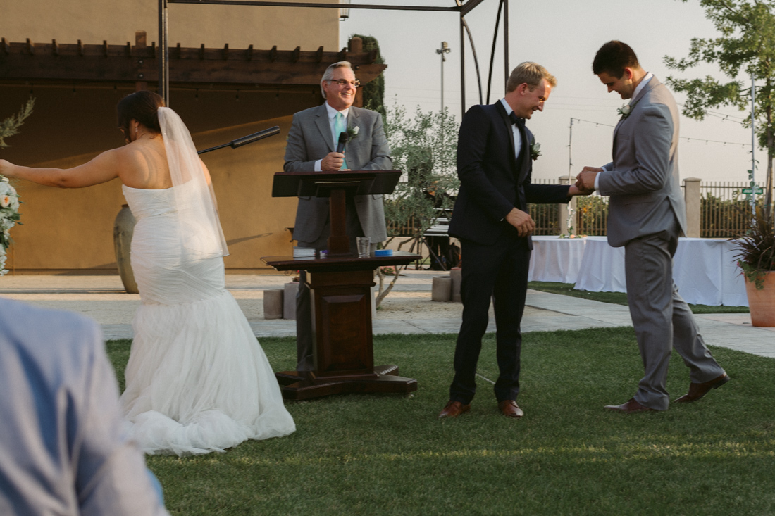 California Wedding private venue bride and groom sharing rings photo 