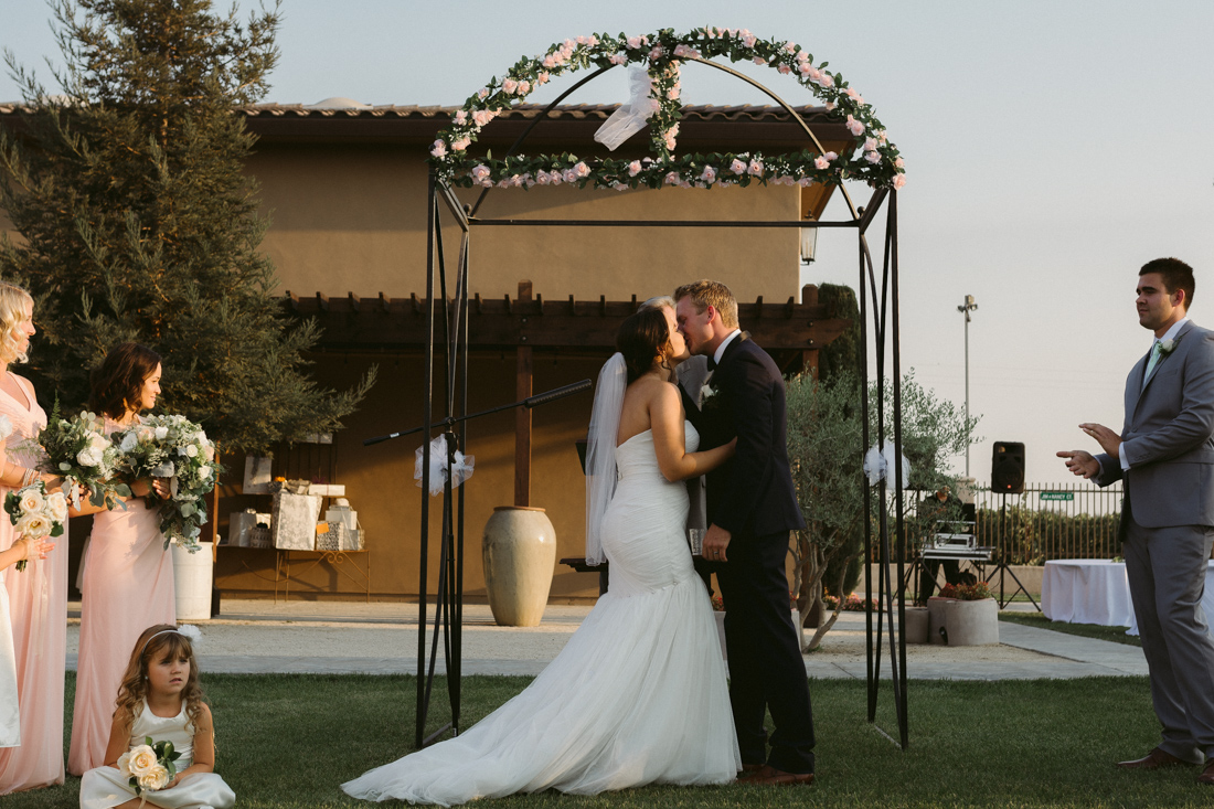 California Wedding private venue bride and grooms first kiss
