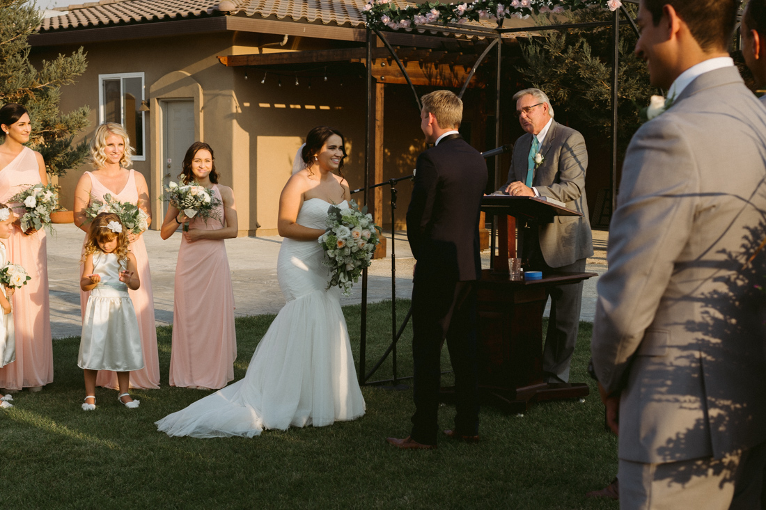 California Wedding private venue bride and groom smiling during the wedding ceremony   