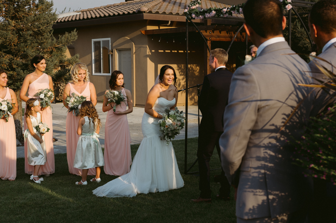 California Wedding private venue bride smiling during the wedding ceremony