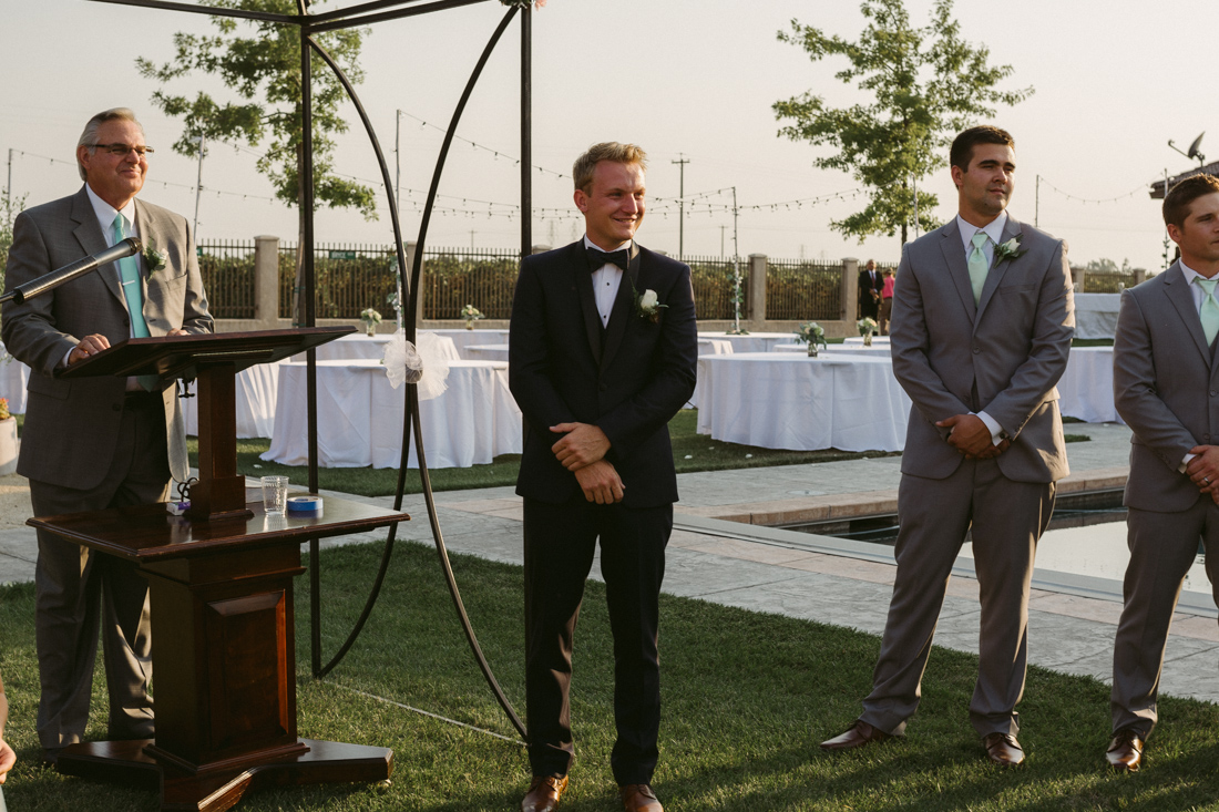 California Wedding private venue groom waiting for his bride to walk down the aisle  