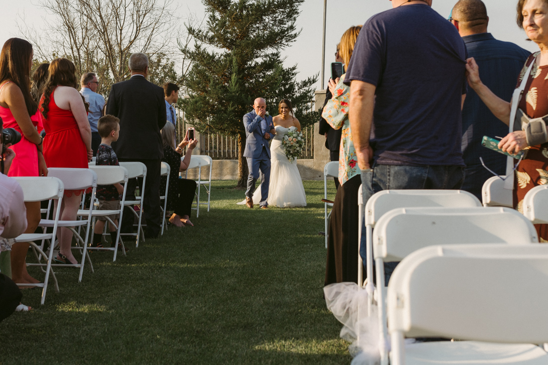 California Wedding private venue bride talking down the aisle photo 