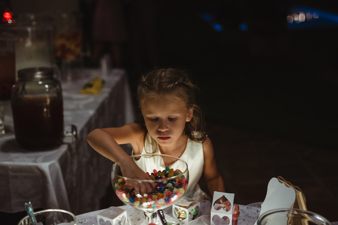 California Wedding private venue flower girl at the candy table 