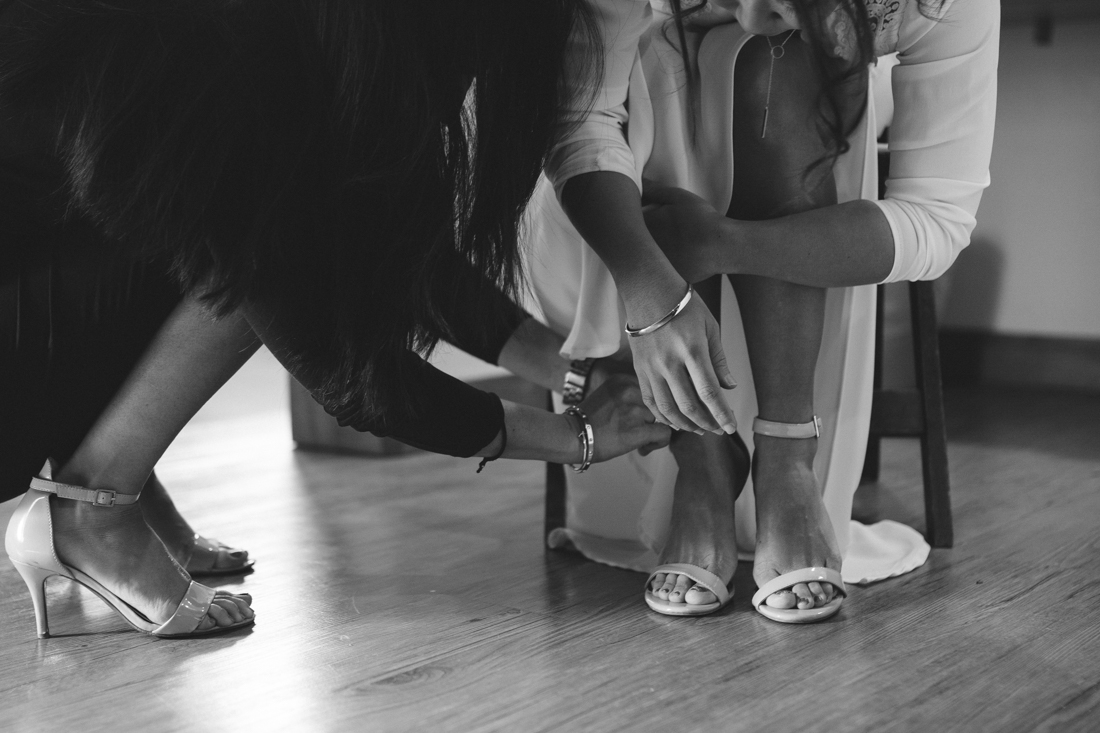 North Tahoe Lodge Wedding bride putting on her shoes photo 