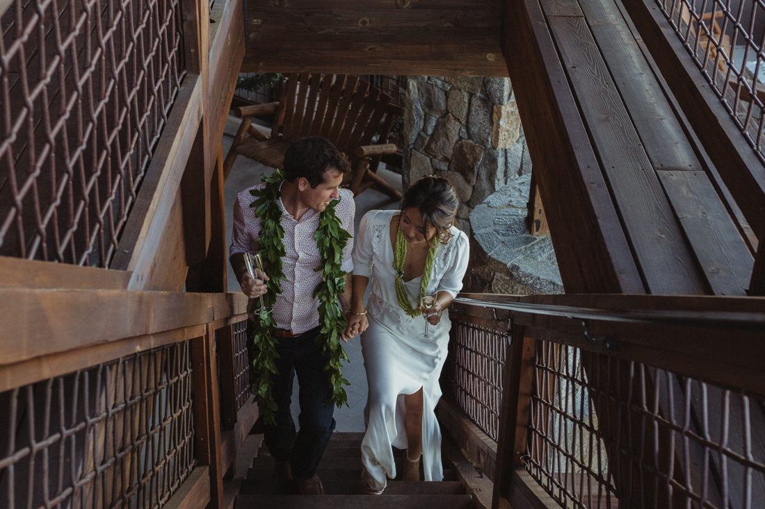 North Tahoe Lodge Wedding couple walking up the stairs photo