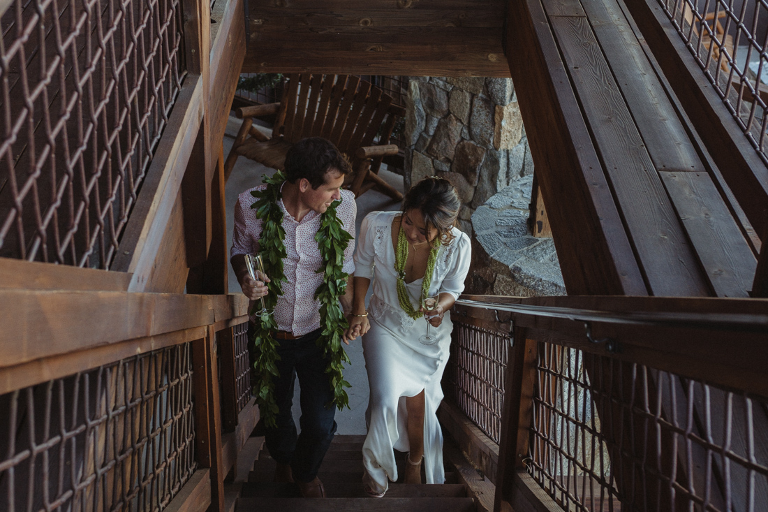 North Tahoe Lodge Wedding couple walking up the stairs photo 