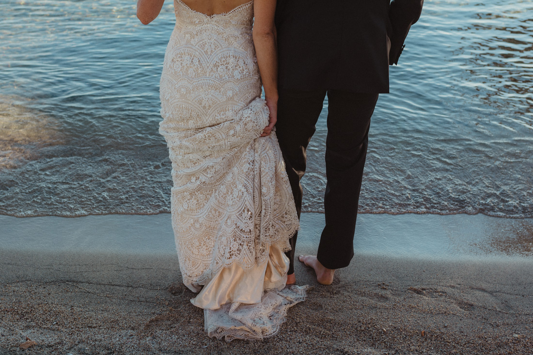 Incline village beach wedding couple standing by the beach photo