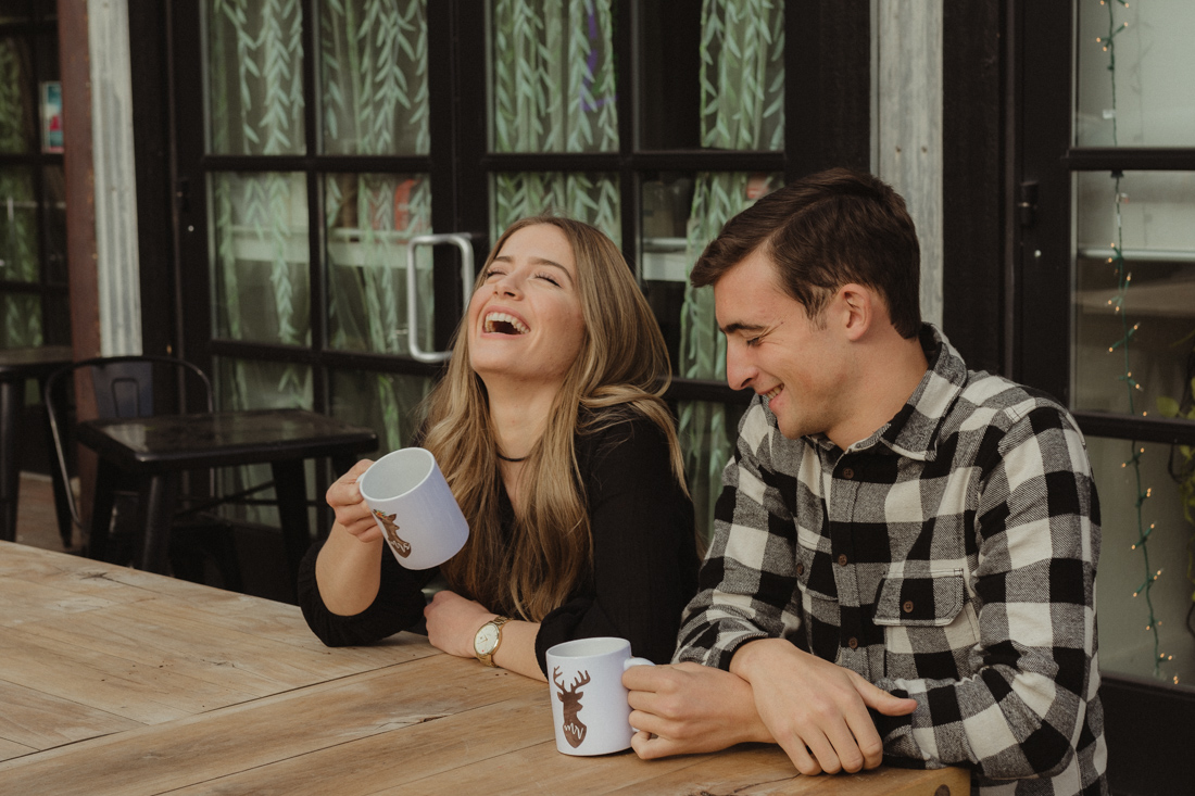couple modeling mugs photo