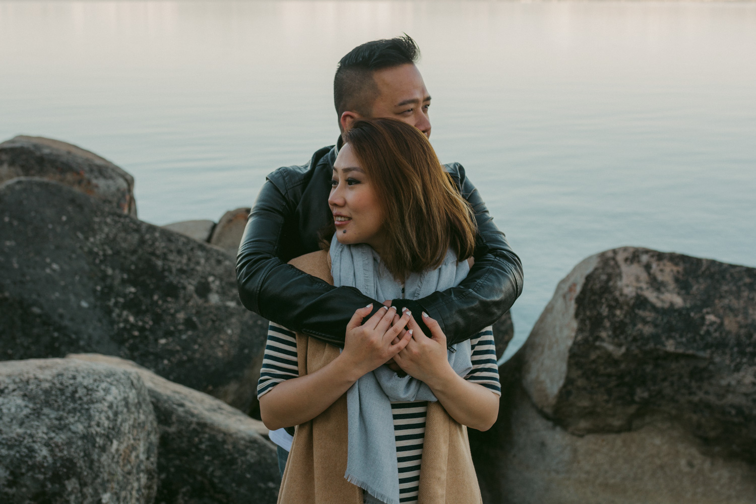 Lake Tahoe engagement session couple holding each other photo