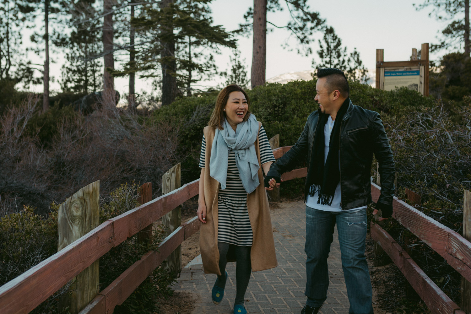 Lake Tahoe engagement session couple holding hands photo