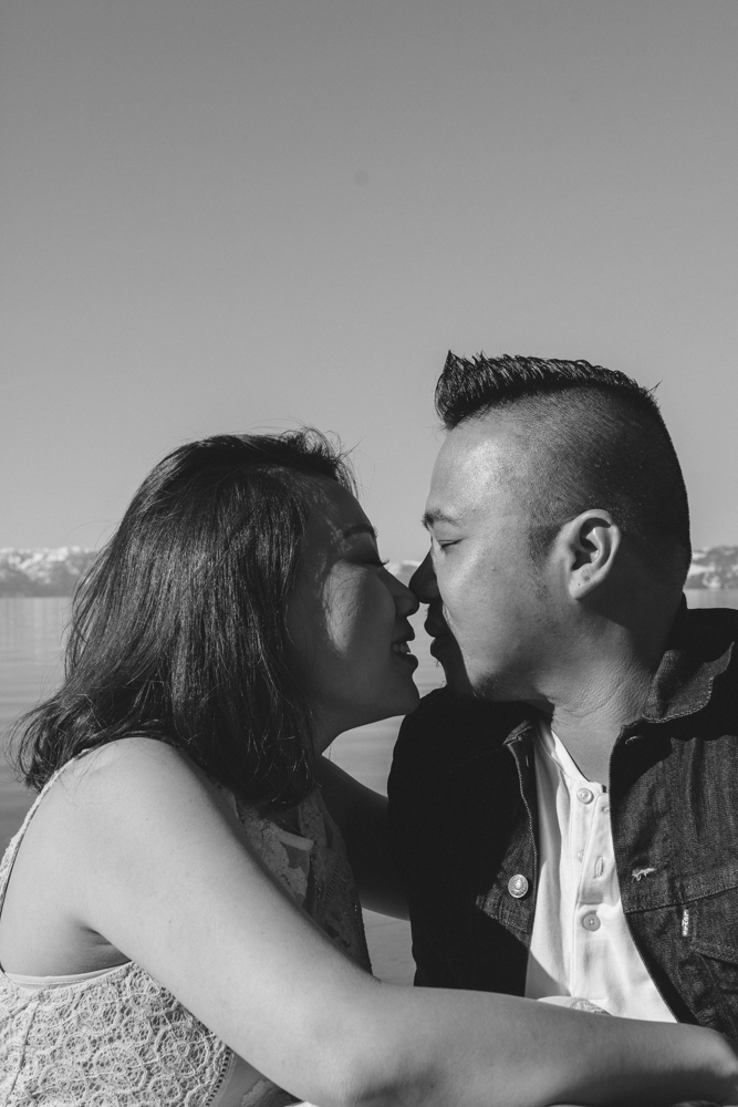 Lake Tahoe engagement session couple cuddling on the sand photo 