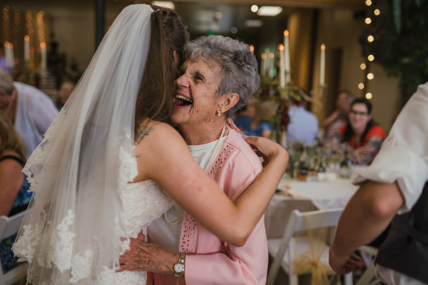 Wilbur D May Museum wedding, bride hugging her grandma photo