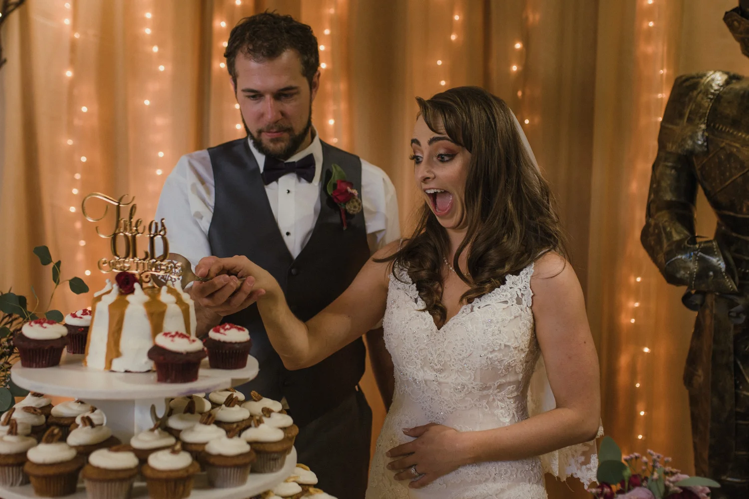 Wilbur D May Museum wedding, couple cutting the cake photo