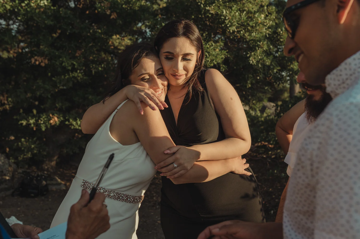 Lake Tahoe elopement bride hugging her sister photo